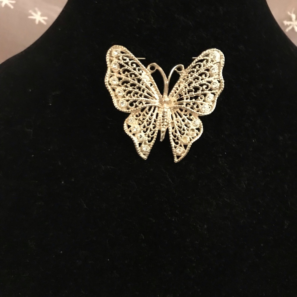 Vintage gold tone and rhinestone butterfly brooch
